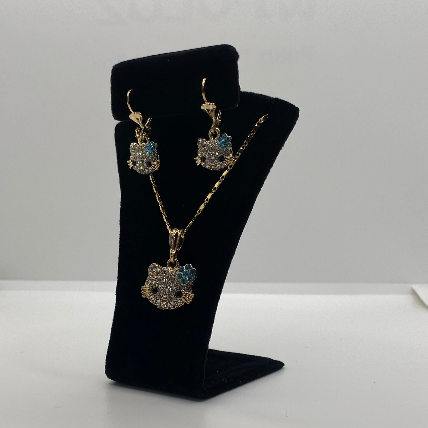 Hello Kitty Blue Rhinestone Airplane Crystal Pendant Necklace – Ariel  Bella's Tangible Treasures